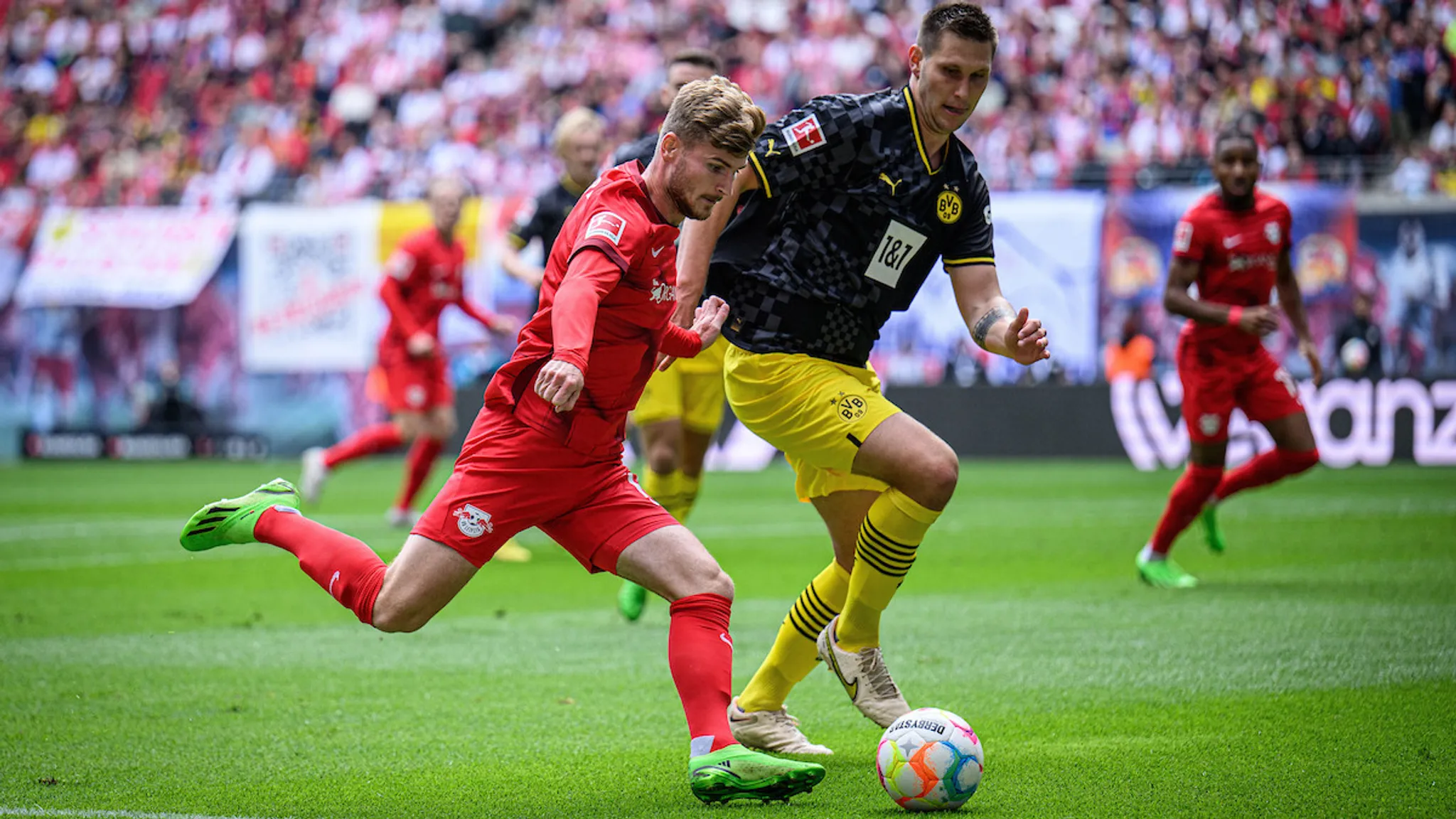 Timo Werner tries to go past Niklas Süle.