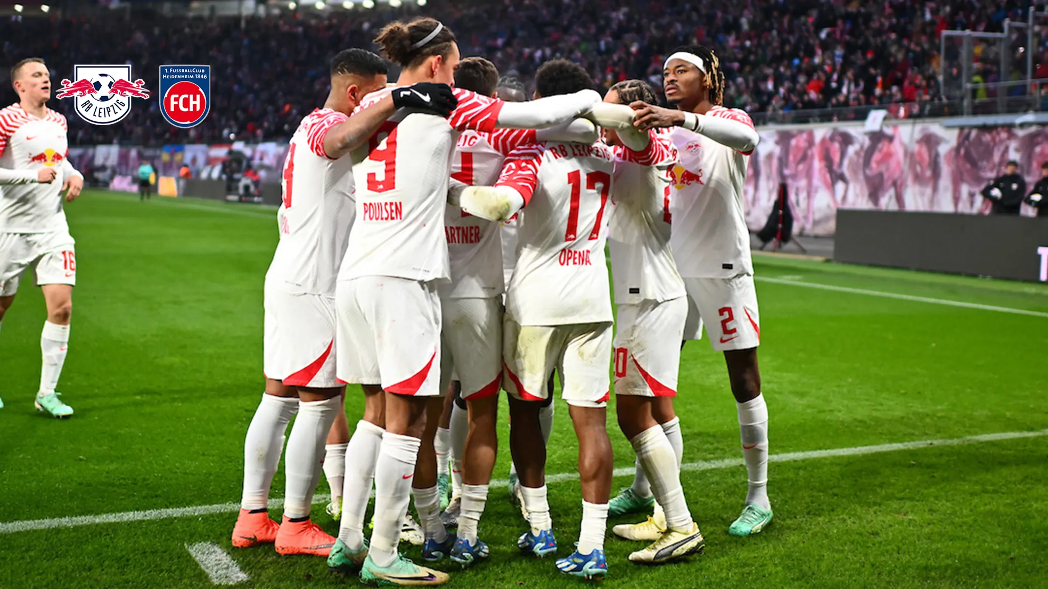 The RB Leipzig players celebrate the opening goal against Heidenheim