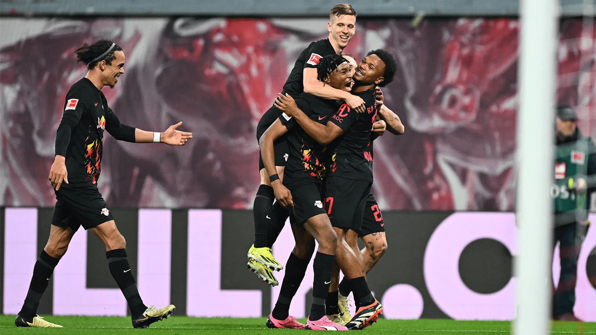 Leipzig cheering: Dani Olmo, Mo Simakan and Yussi Poulsen celebrate with Lois Openda after his goal.